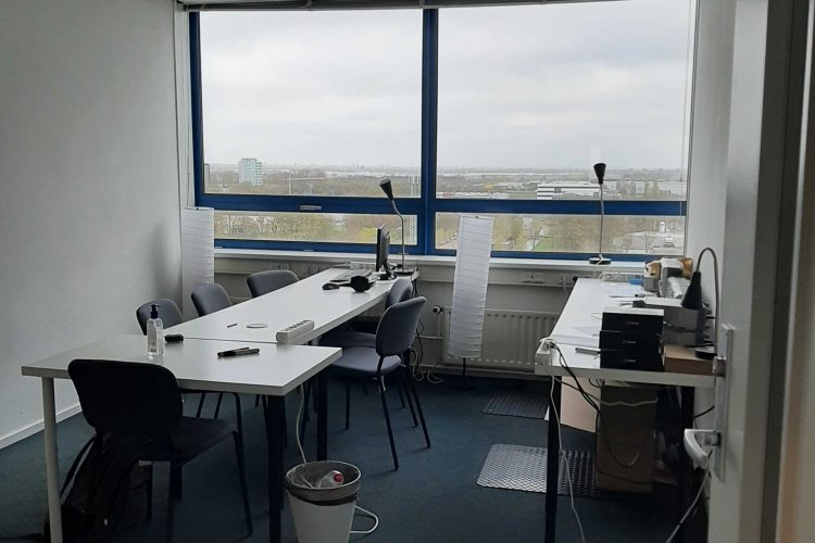 Inside of our Delft office with chairs and desks